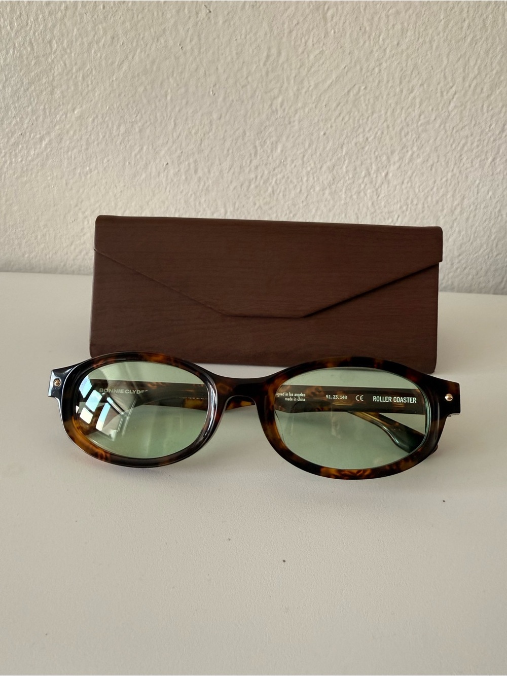 Bonnie Clyde Rollercoaster Tortoiseshell Oval Sunglasses with Green Lenses